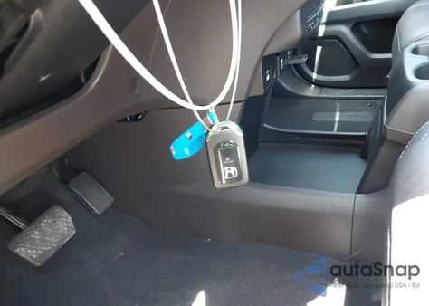 2022 Honda Odyssey Touring z USA, uszkodzony, nr VIN 5FNRL6H8XNB025847